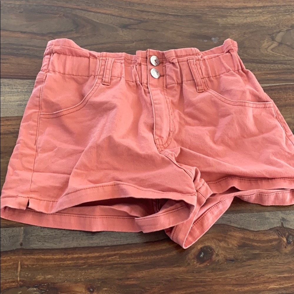High waist peach shorts.